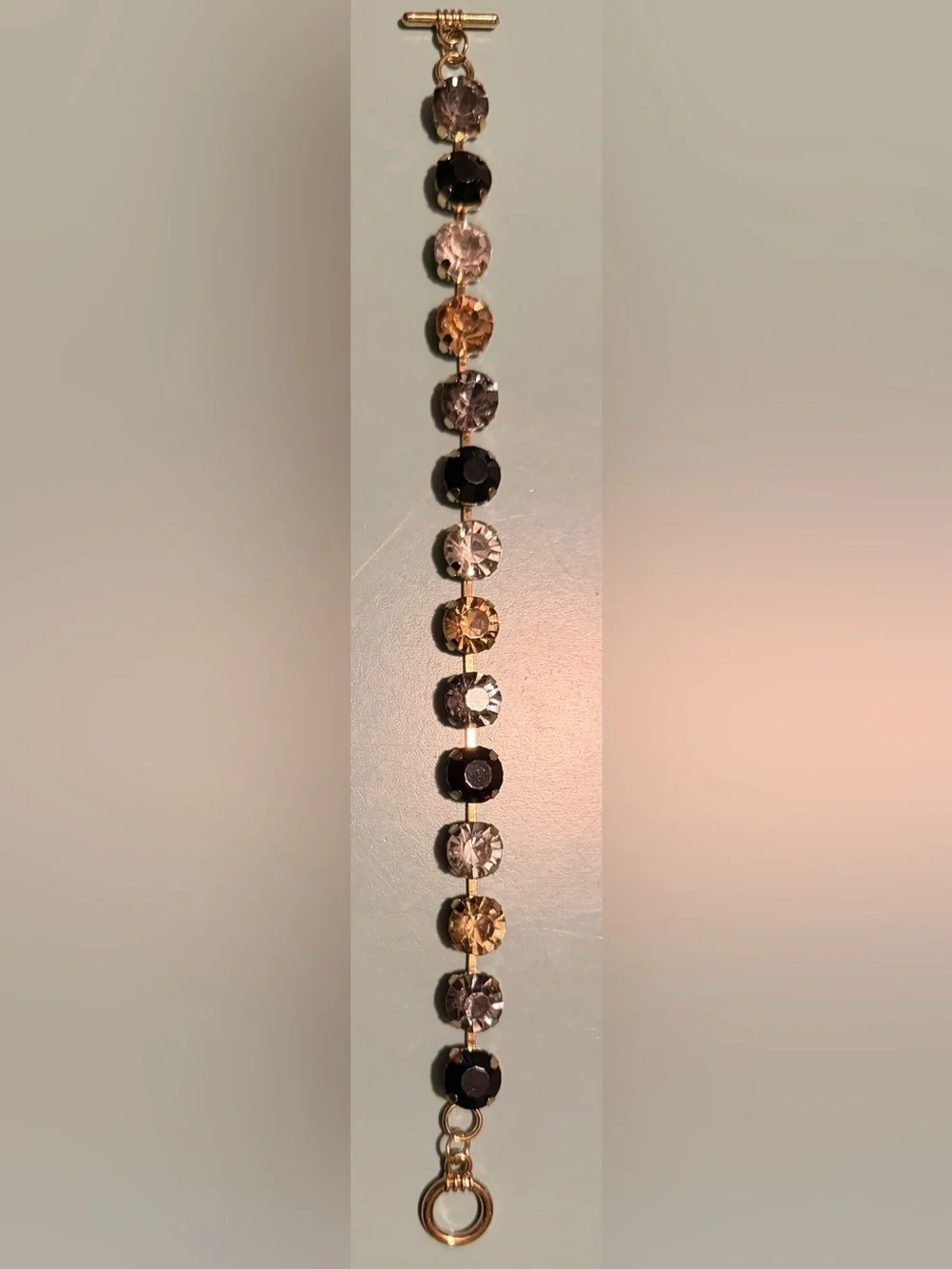 Gold-Tone Bracelet with Black, Gray, & Champagne Crystals